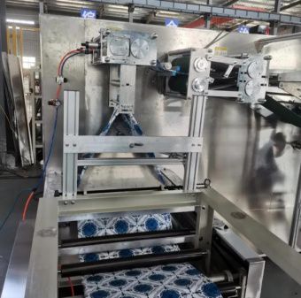 картинка Линия для резки, складывания и упаковки скатертей (модель DR-1400) от магазина Метасила