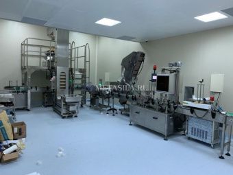 фото Линия для наполнения и укупорки жидкости в пакеты от магазина Метасила