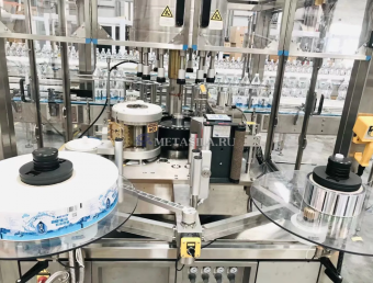 фото Маркировка упаковки этикетками оборудование от магазина Метасила